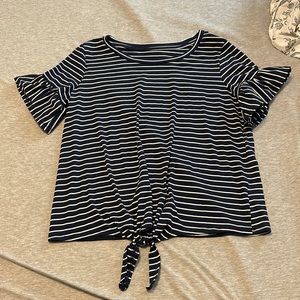 Blue and white striped shirt with ruffled sleeves and a tie bow at the bottom